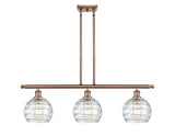 516-3I-AC-G1213-8 3-Light 36" Antique Copper Island Light - Clear Athens Deco Swirl 8" Glass - LED Bulb - Dimmensions: 36 x 8 x 11<br>Minimum Height : 20.375<br>Maximum Height : 44.375 - Sloped Ceiling Compatible: Yes