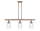516-3I-AC-G352 3-Light 36" Antique Copper Island Light - Clear Waterglass Candor Glass - LED Bulb - Dimmensions: 36 x 5.5 x 11<br>Minimum Height : 20.375<br>Maximum Height : 44.375 - Sloped Ceiling Compatible: Yes