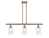 516-3I-AC-G802 3-Light 36" Antique Copper Island Light - Clear Clymer Glass - LED Bulb - Dimmensions: 36 x 3.875 x 12<br>Minimum Height : 21.375<br>Maximum Height : 45.375 - Sloped Ceiling Compatible: Yes