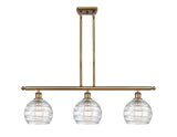 516-3I-BB-G1213-8 3-Light 36" Brushed Brass Island Light - Clear Athens Deco Swirl 8" Glass - LED Bulb - Dimmensions: 36 x 8 x 11<br>Minimum Height : 20.375<br>Maximum Height : 44.375 - Sloped Ceiling Compatible: Yes