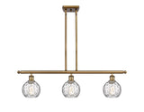 516-3I-BB-G1215-6 3-Light 36" Brushed Brass Island Light - Clear Athens Water Glass 6" Glass - LED Bulb - Dimmensions: 36 x 7 x 9<br>Minimum Height : 20.375<br>Maximum Height : 44.375 - Sloped Ceiling Compatible: Yes