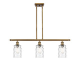 516-3I-BB-G352 3-Light 36" Brushed Brass Island Light - Clear Waterglass Candor Glass - LED Bulb - Dimmensions: 36 x 5.5 x 11<br>Minimum Height : 20.375<br>Maximum Height : 44.375 - Sloped Ceiling Compatible: Yes