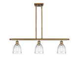 516-3I-BB-G442 3-Light 36" Brushed Brass Island Light - Clear Brookfield Glass - LED Bulb - Dimmensions: 36 x 5 x 10<br>Minimum Height : 19.375<br>Maximum Height : 43.375 - Sloped Ceiling Compatible: Yes
