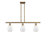 516-3I-BB-G81 3-Light 36" Brushed Brass Island Light - Matte White Eaton Glass - LED Bulb - Dimmensions: 36 x 5.5 x 11<br>Minimum Height : 20.375<br>Maximum Height : 44.375 - Sloped Ceiling Compatible: Yes