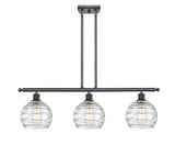 516-3I-BK-G1213-8 3-Light 36" Matte Black Island Light - Clear Athens Deco Swirl 8" Glass - LED Bulb - Dimmensions: 36 x 8 x 11<br>Minimum Height : 20.375<br>Maximum Height : 44.375 - Sloped Ceiling Compatible: Yes