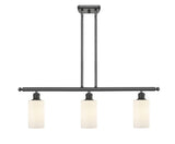 516-3I-OB-G801 3-Light 36" Oil Rubbed Bronze Island Light - Matte White Clymer Glass - LED Bulb - Dimmensions: 36 x 3.875 x 12<br>Minimum Height : 21.375<br>Maximum Height : 45.375 - Sloped Ceiling Compatible: Yes