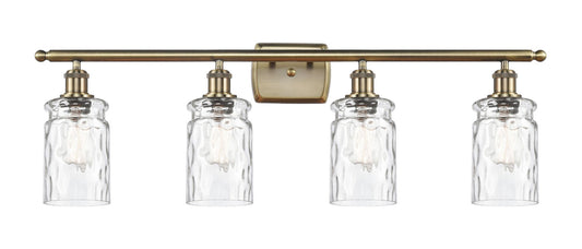 516-4W-AB-G352 4-Light 36" Antique Brass Bath Vanity Light - Clear Waterglass Candor Glass - LED Bulb - Dimmensions: 36 x 8 x 11 - Glass Up or Down: Yes
