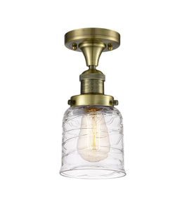 1-Light 5" Antique Brass Semi-Flush Mount - Clear Deco Swirl Small Bell Glass LED