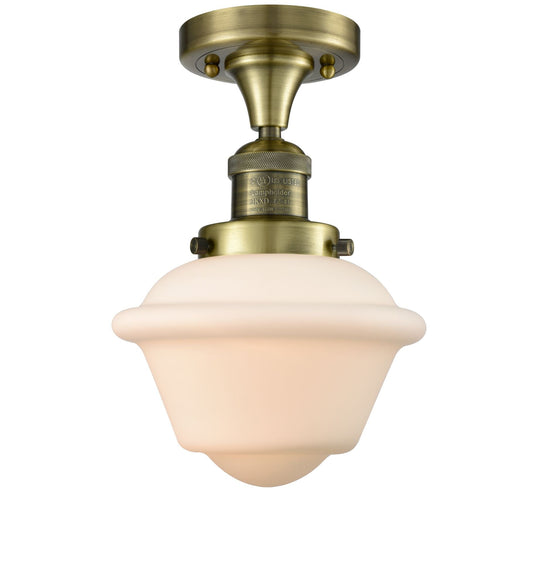 1-Light 7.5" Antique Brass Semi-Flush Mount - Matte White Cased Small Oxford Glass LED