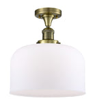 1-Light 12" Antique Brass Semi-Flush Mount - Matte White Cased X-Large Bell Glass LED