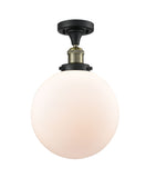 517-1CH-BAB-G201-10 1-Light 10" Black Antique Brass Semi-Flush Mount - Matte White Cased Beacon Glass - LED Bulb - Dimmensions: 10 x 10 x 13 - Sloped Ceiling Compatible: No