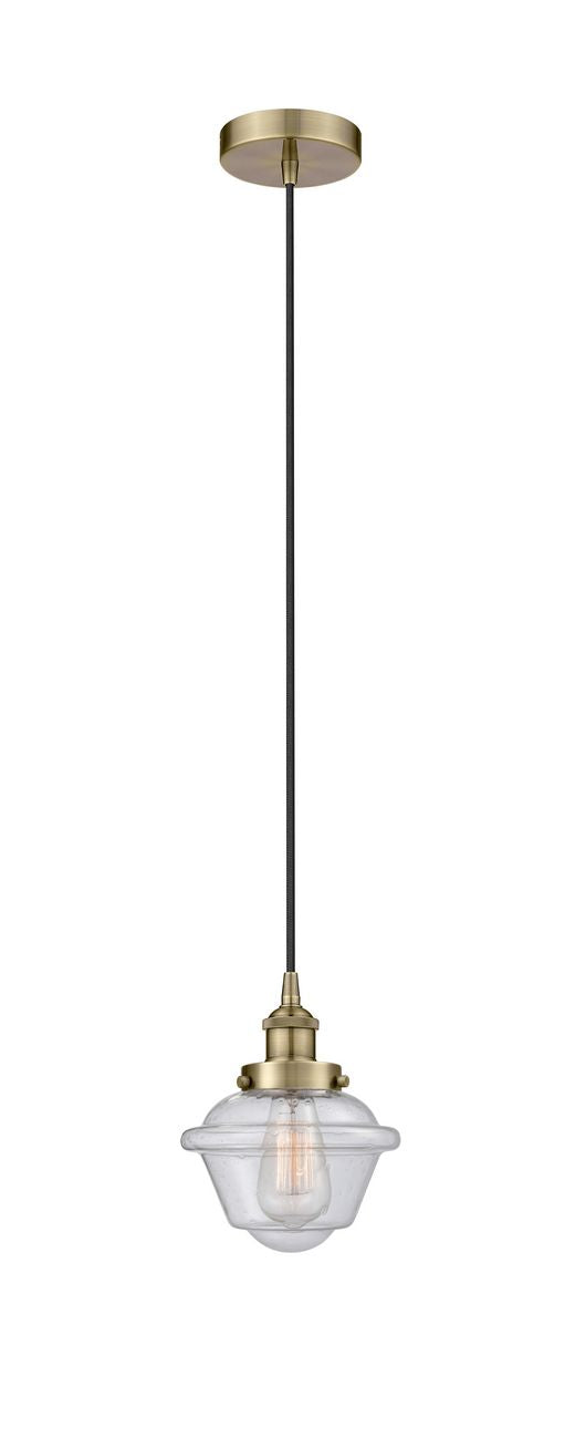 616-1PH-AB-G534 Cord Hung 7.5" Antique Brass Mini Pendant - Seedy Small Oxford Glass - LED Bulb - Dimmensions: 7.5 x 7.5 x 8<br>Minimum Height : 13<br>Maximum Height : 131 - Sloped Ceiling Compatible: Yes