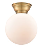 1-Light 10" Antique Brass Flush Mount - Matte White Cased Beacon Glass LED