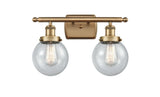 916-2W-BB-G204-6 2-Light 16" Brushed Brass Bath Vanity Light - Seedy Beacon Glass - LED Bulb - Dimmensions: 16 x 7.5 x 11 - Glass Up or Down: Yes