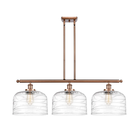 916-3I-AC-G713-L 3-Light 36" Antique Copper Island Light - Clear Deco Swirl X-Large Bell Glass - LED Bulb - Dimmensions: 36 x 8 x 11<br>Minimum Height : 20.375<br>Maximum Height : 44.375 - Sloped Ceiling Compatible: Yes