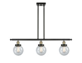 916-3I-BAB-G204-6 3-Light 36" Black Antique Brass Island Light - Seedy Beacon Glass - LED Bulb - Dimmensions: 36 x 6 x 10<br>Minimum Height : 19.375<br>Maximum Height : 43.375 - Sloped Ceiling Compatible: Yes