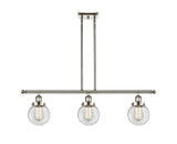 916-3I-PN-G202-6 3-Light 36" Polished Nickel Island Light - Clear Beacon Glass - LED Bulb - Dimmensions: 36 x 6 x 10<br>Minimum Height : 19.375<br>Maximum Height : 43.375 - Sloped Ceiling Compatible: Yes