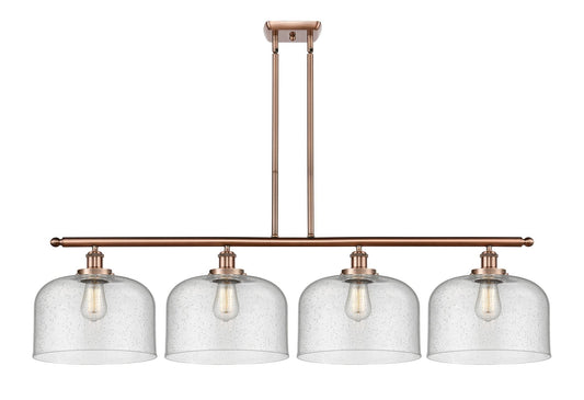916-4I-AC-G74-L 4-Light 48" Antique Copper Island Light - Seedy X-Large Bell Glass - LED Bulb - Dimmensions: 48 x 8 x 10<br>Minimum Height : 20.375<br>Maximum Height : 44.375 - Sloped Ceiling Compatible: Yes
