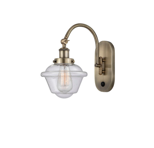 918-1W-AB-G534 1-Light 7.5" Antique Brass Sconce - Seedy Small Oxford Glass - LED Bulb - Dimmensions: 7.5 x 13.75 x 12.5 - Glass Up or Down: Yes
